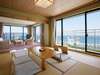 和洋室からの眺望（一例）海の絶景をお楽しみいただけます。