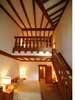 メゾネットルーム重厚な木梁と階段のハートの模様が可愛いチロルの雰囲気のあるお部屋