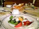 ご朝食の一例。蔵王の景色を一望の食堂でさわやかな朝食をお召し上がりいただけます。