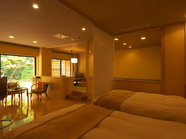 「別邸六花　１階れんぎょう」は露天風呂付き和洋室、通常のツインベッドタイプのお部屋です。