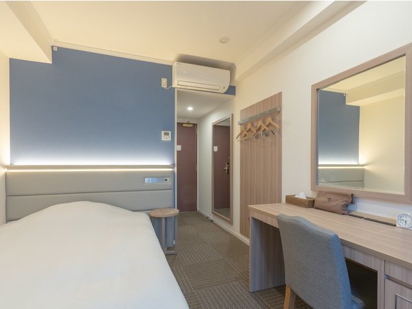 通常のビジネスタイプより広い客室（15.24㎡）。ベッドは縦200cm幅140cm