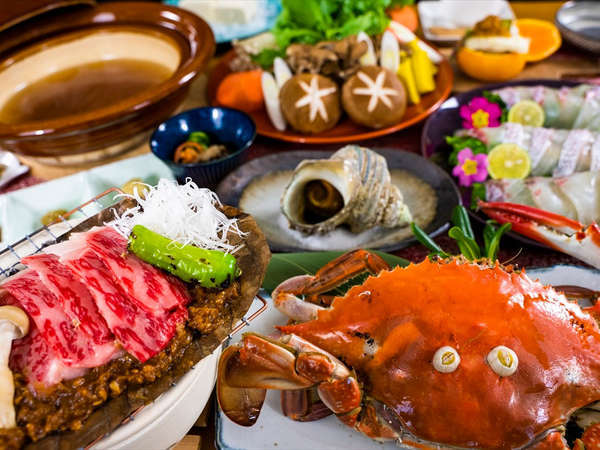 伊予牛の朴葉焼きと渡り蟹と大サザエ