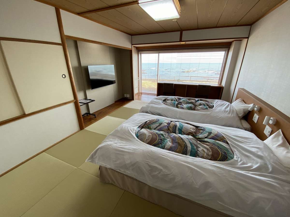 客室一例（禁煙、海側向きのベッドのお部屋です。）