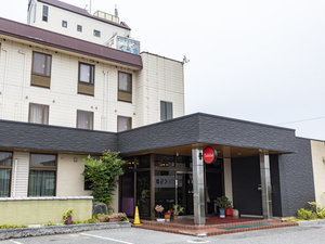「Tabist　ビジネスホテル　くらま　彦根」の外観