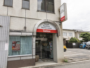 「Tabist　ビジネスホテル末広　松山」の入口部分
