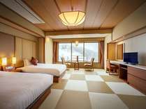 ■南館洋室一例／2021年12月オープン！ベッドはセミダブル、床は足裏に心地良い、和モダンな琉球畳を使用