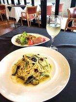 イタリアンディナー付きプランメニューの一例です。「季節野菜のペペロンチーノ」