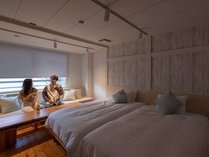 Yubana　Room/ユバナルーム：週に一度行われる湯花流し「ミルキーデイ」の白濁の湯をイメージしたお部屋。