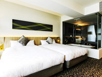 【デラックスツイン】　シンプルでモダンな空間に、140cm幅のベッドをご用意。
