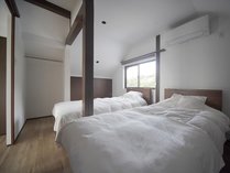 寝室（シングルベッド2台）