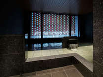【女性浴場】シックなデザインの大浴場で心静まるひと時をお過ごしください。