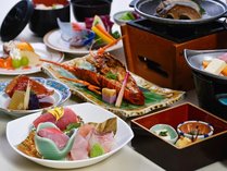 金目鯛の煮付けに鮑と伊勢海老をつけた美味の競演