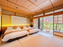 【ガーデンスイート観月亭】和洋室：寝室にはセミダブルのツインベッドを設置。