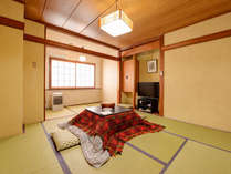 *和室8畳一例／冬はこたつで寛ぎの空間に。
