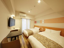 【スーペリアツイン Superior Twin Room】ダブルベッドを2台設置し、最大4名様までご宿泊が可能。