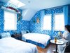 海外旅行気分が楽しめる、全室異なるデザインの可愛い客室が人気。*写真は海をテーマにした「Room207」